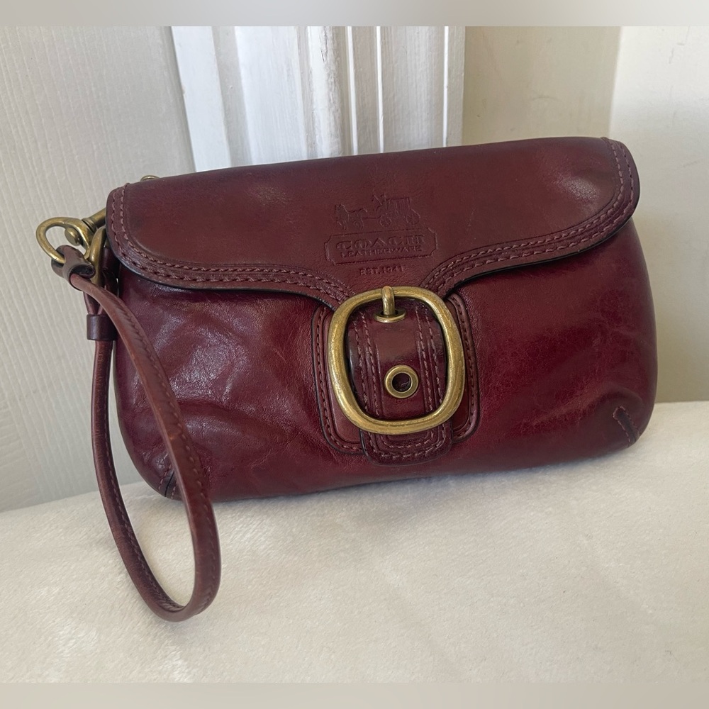 Coach Bleecker buckle flap wristlet Wine Leather